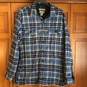 Fleece lined flannel button down coat.